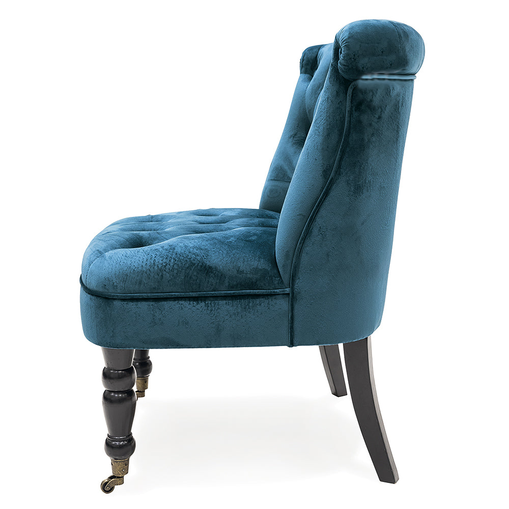 Fauteuil lounge matelassé bleu sarcelle en tissu effet velours, pieds en bois et deux roulettes, design rétro vintage Sibilla