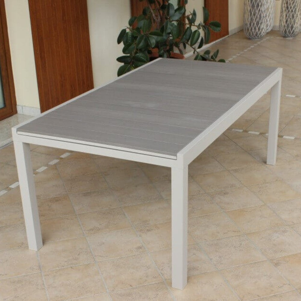 Table d'extérieur extensible 180/240 cm avec structure en aluminium et plateau en polywood effet bois avec lattes Futy