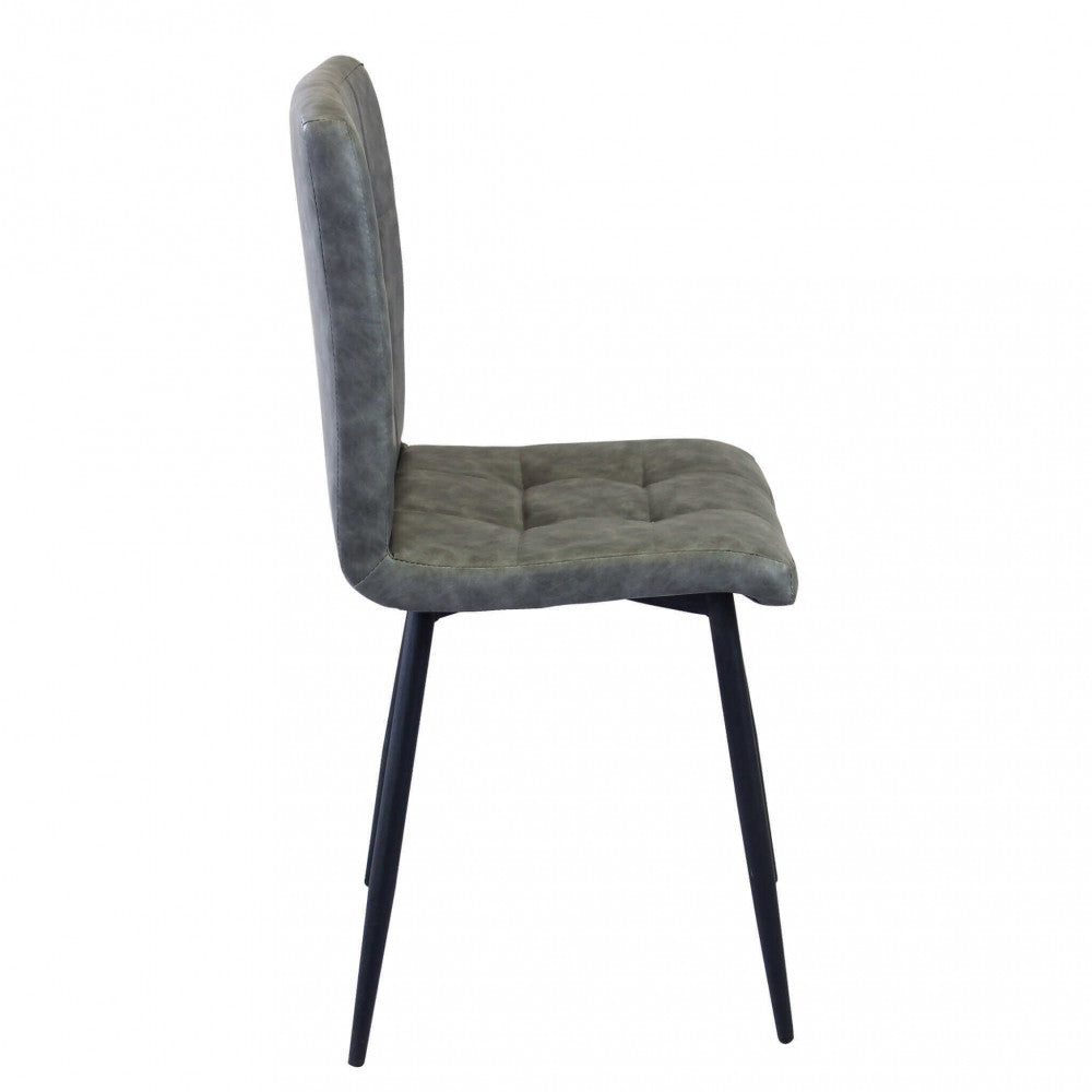 Sedia da interno sala da pranzo con struttura in metallo e seduta larga rivestita in ecopelle Ginter