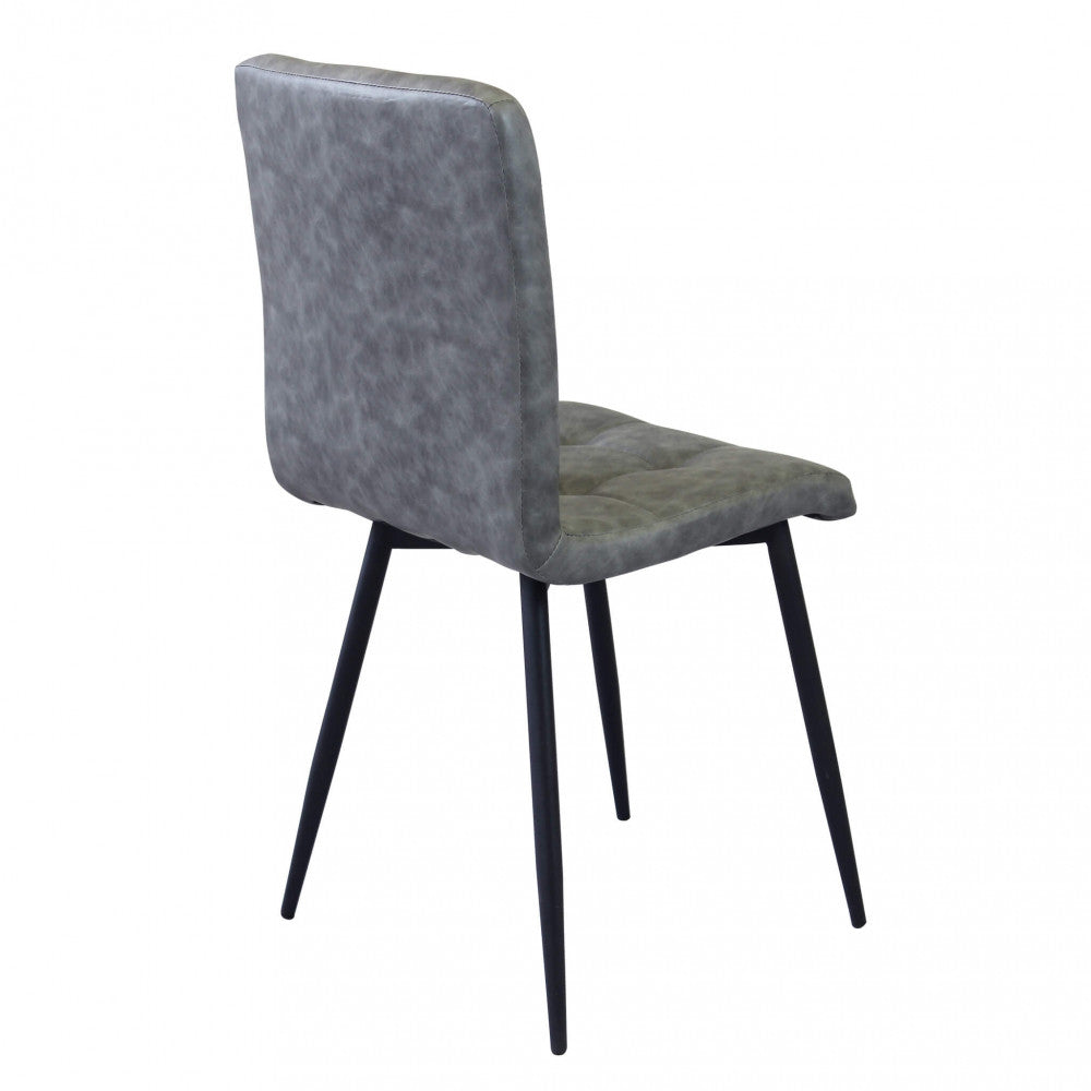 Sedia da interno sala da pranzo con struttura in metallo e seduta larga rivestita in ecopelle Ginter