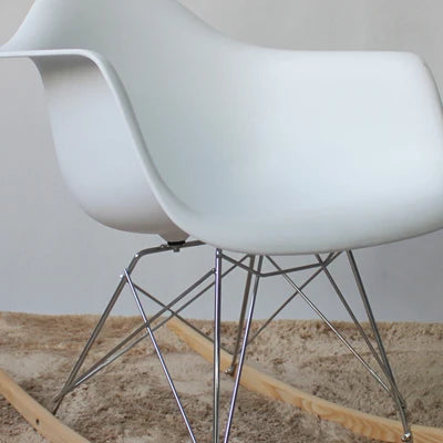 Sedia poltrona a dondolo da interno ufficio salotto con struttura in acciaio e seduta in ABS Julian